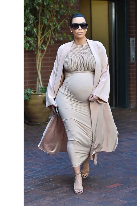 Kim kardashian pregnant couch dress. Kim Kardashian Is Keeping Up With Sheer Maternity Looks ...