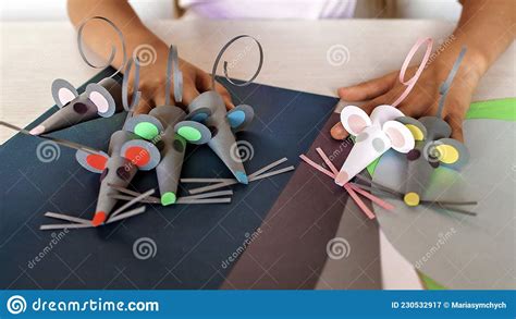 Cute 7 8 Years Old Girl Making Crafted Mice With Colored Paper Stock