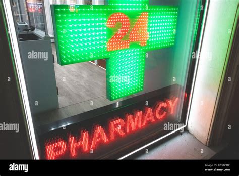 pharmacy 24 hour cross sign medical health medicine first aid Stock