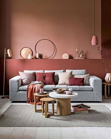 A Living Room Filled With Lots Of Furniture Next To A Wall Covered In