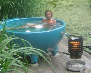 Very modern tub or stock tank. t i n y g o g o : Doug and Erin's wood-fired hot tub ...