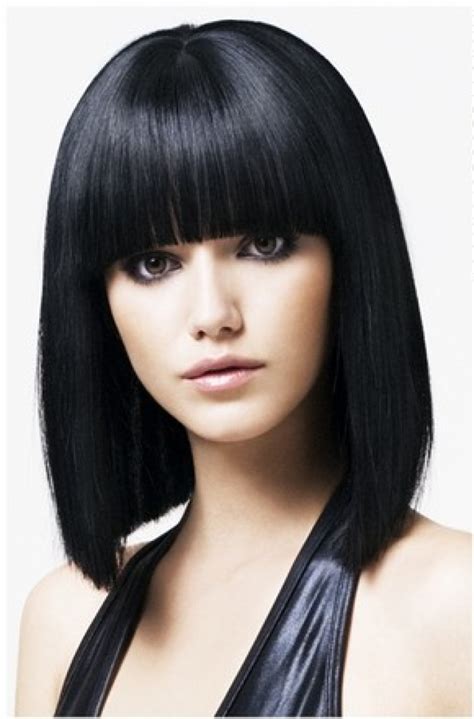 Layers are cut all over this glossy black mane to balance out the volume and body of the hair. Short hair | hair style in 2013