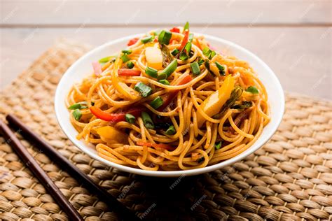 Premium Photo Schezwan Noodles Or Vegetable Hakka Noodles Or Chow