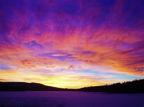 Sunset Over Frozen Lake Photograph By Christopher Kimmel Fine Art America