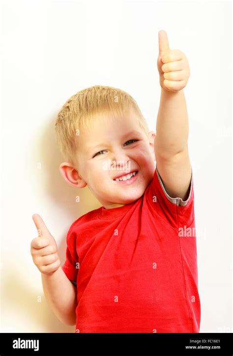 Little Boy Showing Thumb Up Success Hand Sign Gesture Stock Photo Alamy