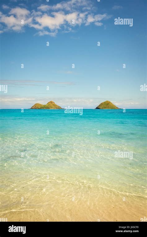 The Crystal Clear Turquoise And Emerald Green Waters Of Lanikai Beach