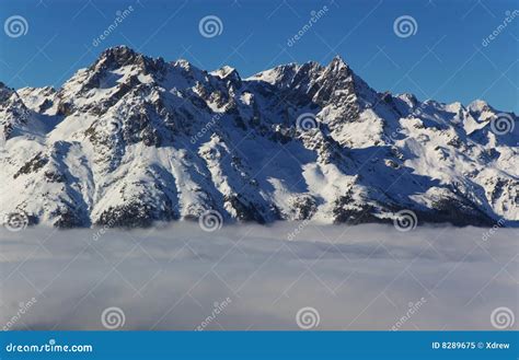 Snow Capped Alpine Peaks Stock Image Image Of Peaks Formations 8289675