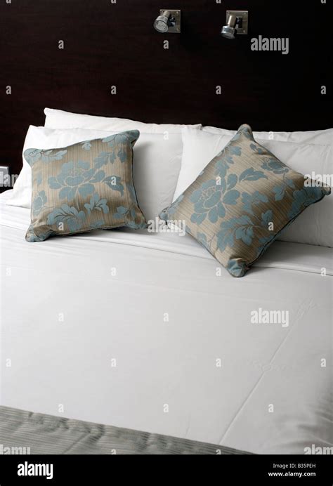 A Freshly Made Bed In A Hotel Bedroom Stock Photo Alamy