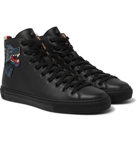 Fila sneakers look sleek and sporty in cool black and bright white. Gucci Major Wolf-appliquéd Full-grain Leather High-top ...