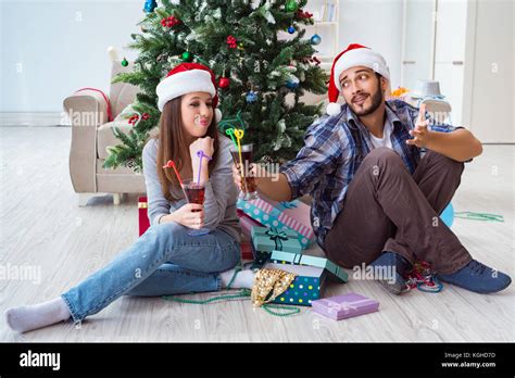 Young pair in conflict situation during christmas night Stock Photo - Alamy