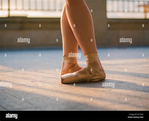 Close Up Of A Ballet Dancers Feet As She Practices Pointe Exercises On