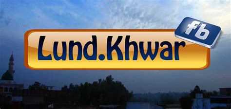 A Yellow And Blue Sign With The Words Lund Khwar On It In Front Of A