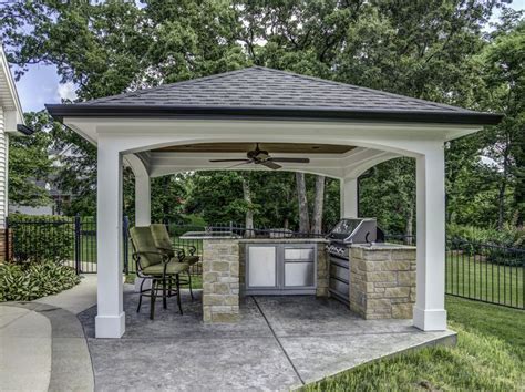 This Impressive Outdoor Cooking Area Features A Hip Roof