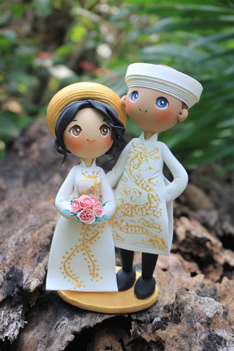 These were made for a couple whose surname is shepherd, hence the sheep theme. World Cake Topper. Ao Dai Wedding Cake Topper