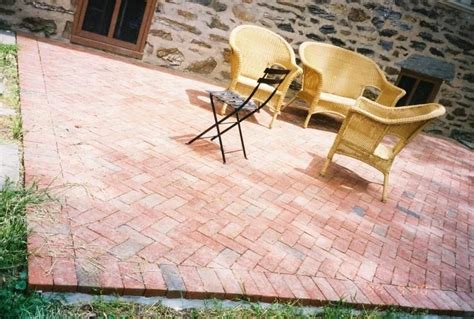 Simple stone patio and chair ideas. 20 Charming Brick Patio Designs
