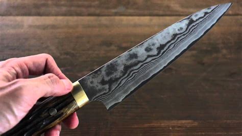 japanese knife chef handle damascus finish gyuto saji takeshi
