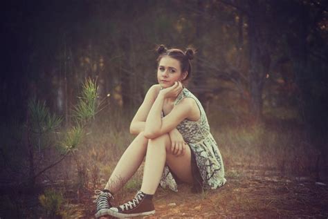 Free Stock Photo Of Teenage Girl Sitting In The Forest Looking At