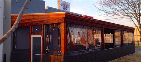 Which is the best brand for patio enclosures? Southern Patio Enclosures | Restaurant Wind Screens