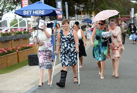 York Races Ladies Day Sees Glamorous Ladies Don Rain Macs Daily Mail