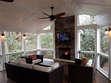 Screened Porch With Fireplace And Wall Sconces Deckscapes