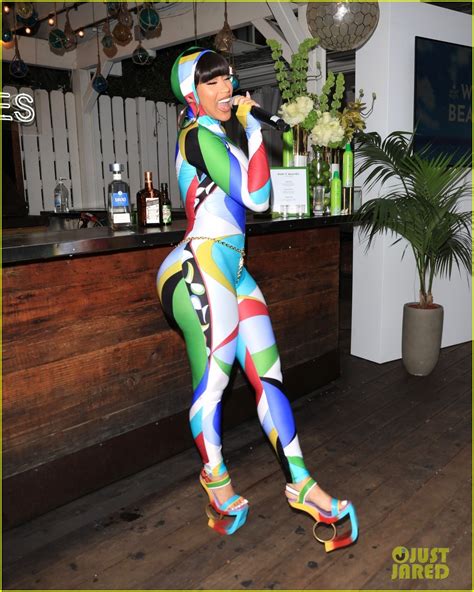 Cardi B Shows Off Her Curves In Vibrant Figure Hugging Bodysuit At Launch Party For Her New