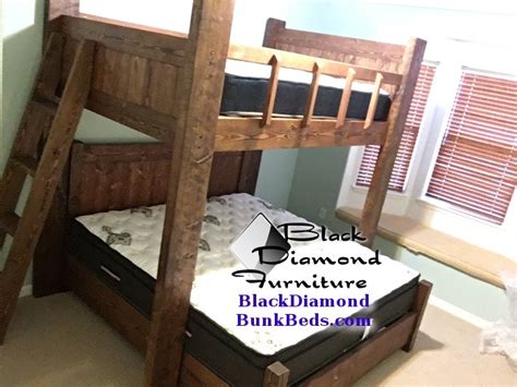 Since the bed is not a typical size, a standard bunk bed ladder won't do. Colorado River Custom Bunk Bed