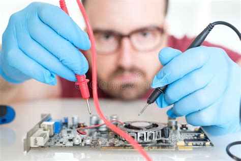 Expert Man Assembling Pc And Checking For Problem Stock Photo Image