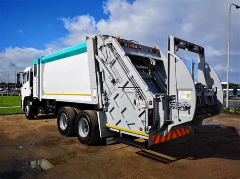 garbage truck rear loader pt  transtech