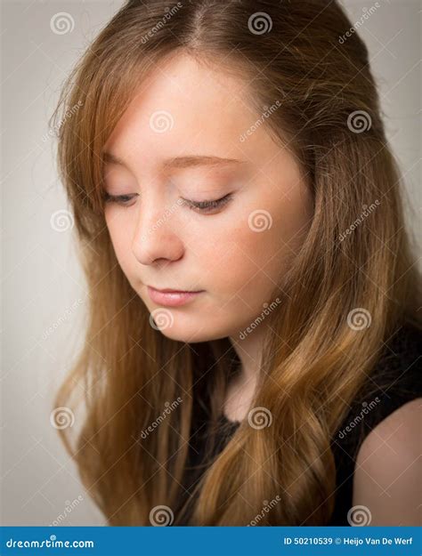 Ginger Teenage Girl Looking Down Stock Image Image Of Alone Studio