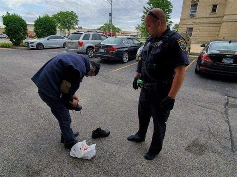 Cop Gives Homeless Man Shoes Off His Own Feet Patchpm Across