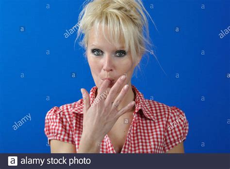 Woman Sucking Her Finger Stock Photo Alamy