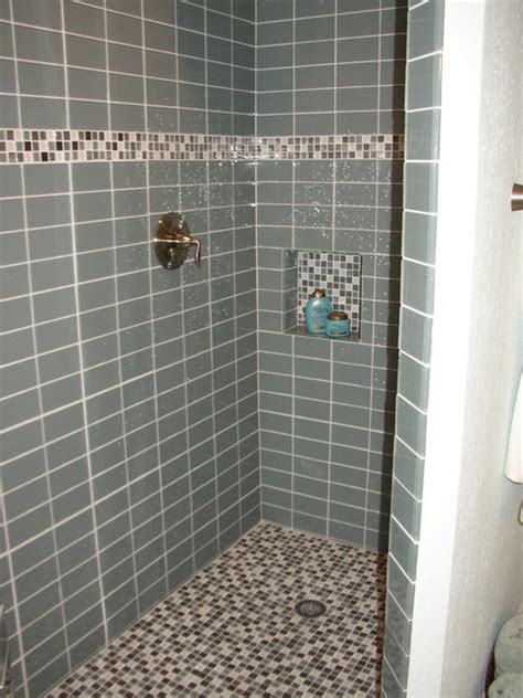 For small bathrooms, mirrored subway tiles are a. Glass Subway Tile Bathrooms by SubwayTileOutlet.com ...