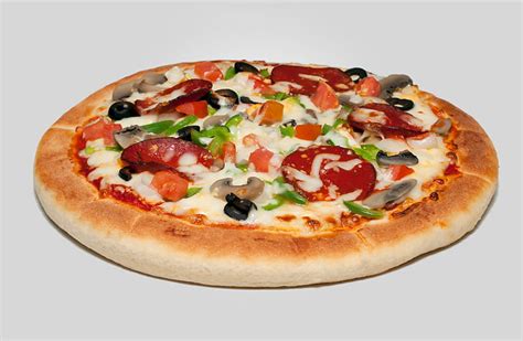 As i wrote before medium size pizza (750 g) has 1995 calories. Royalty-Free photo: Whole cheese pizza | PickPik