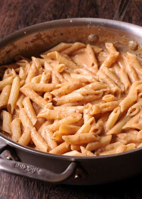 Bring sauce to a simmer and stir in cooked pasta to coat. Creamy Cajun Chicken and Sausage Pasta - What's In The Pan?