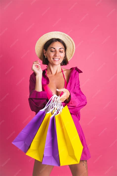 premium photo beautiful fit tanned sporty woman in shirt and bikini with colorful shopping