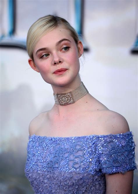 Elle Fanning Wearing Light Blue Embroidered Evening Dress Silver