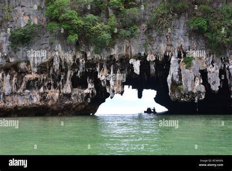Tham Lod Yai Grotto Cave Jungle Covered Limestone Cliffs At Phang Nga