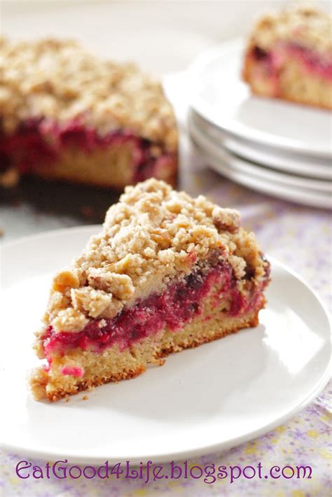 A frosted holiday yeast coffee cake filled with nuts and candied fruit. Cranberry coffee cake