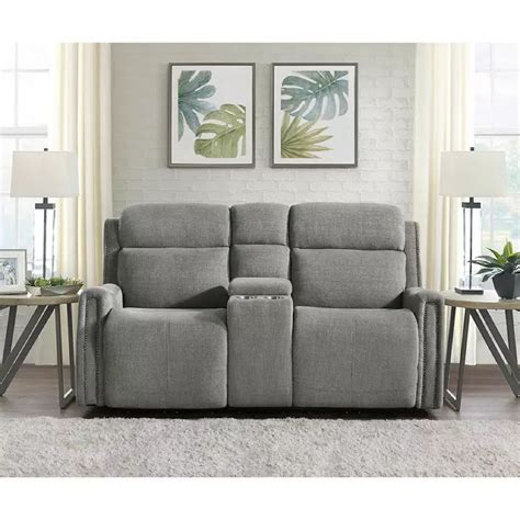 The Reclining Loveseat In Grey Fabric With Two Side Tables Next To It