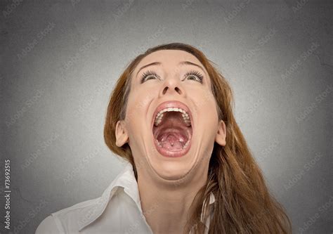 Headshot Screaming Woman With Wide Open Mouth Looking Up Stock Photo Adobe Stock