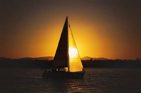 Premium Photo Sailing Yacht Against Sunset