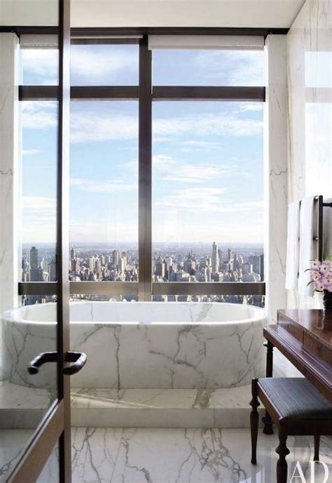 Let your local dealer help you. NYC skyline view from tub. | Marble bathroom designs ...