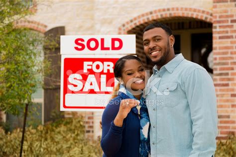 Real Estate African Descent Couple Buys First Home House Key Stock