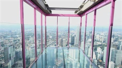 At 300 meters up, the sky box extends out from the sky deck ledge. Menara Kuala Lumpur | Holiday travel, Asia travel