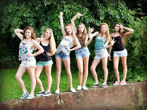 Large Group Of Best Friends Posing Together On A Concrete Friend