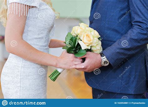 Wedding Couple With Flowers Bouquet Of Roses Stock Image Image Of