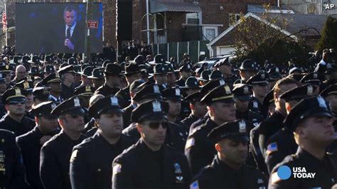 Local Police Mourn Nypd Cop Wenjian Liu At Funeral