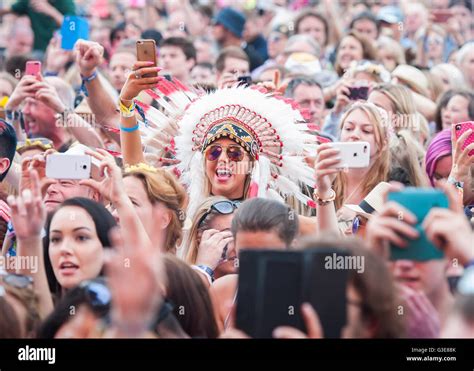 Festival Goers Watch Acts On The Mainstage At The Isle Of Wight Festival In Seaclose Park