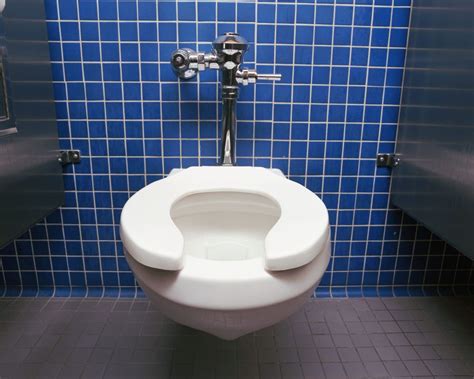 Why Public Toilet Seats Are U Shaped Southern Living