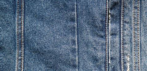 Texture Of Blue Jeans Denim Fabric Wath Seam Background Stock Photo